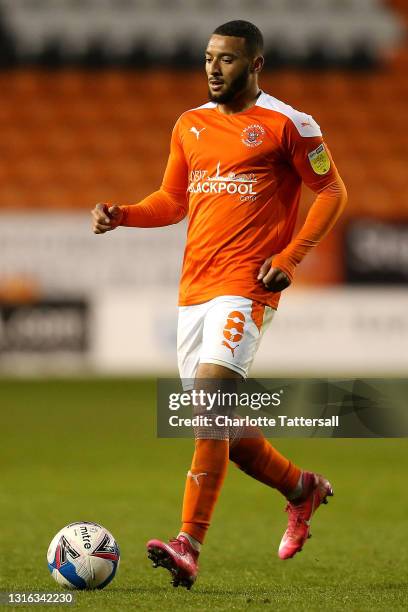 Keshi Anderson of Blackpool runs with the ball during the Sky Bet League One match between Blackpool and Doncaster Rovers at Bloomfield Road on May...