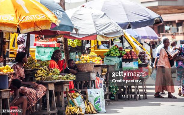 market scene - lagos, nigeria - nigeria stock pictures, royalty-free photos & images