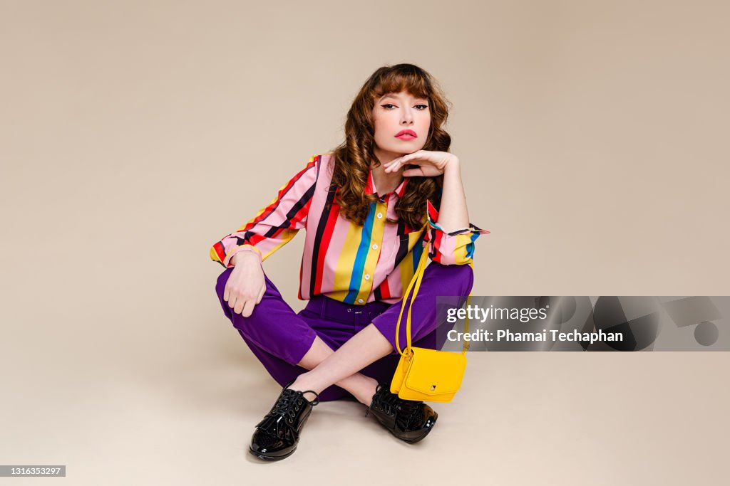 Fashionable woman in retro style clothes