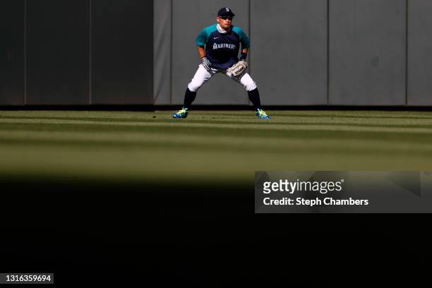Former player Ichiro Suzuki of the Seattle Mariners fields during batting practice before the game against the Baltimore Orioles at T-Mobile Park on...