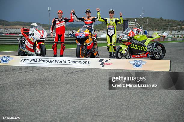 MotoGP World Champions: Stefan Bradl of Germany and Viessmann Kiefer Racing, Casey Stoner of Australia and Repsol Honda Team and Nicolas Terol of...