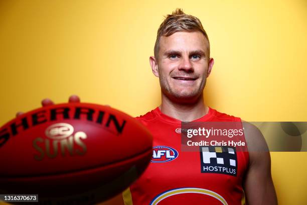 Brandon Ellis of the Suns poses ahead of his 200th match at Metricon Stadium on May 05, 2021 in Gold Coast, Australia.