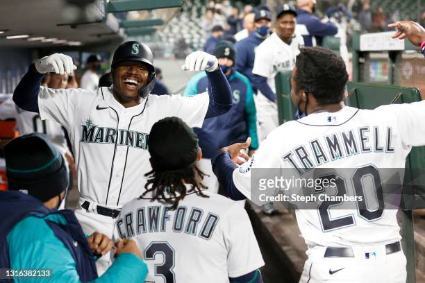 Kyle Lewis of the Seattle Mariners reacts after his three-run home run against the Baltimore Orioles during the eighth inning at T-Mobile Park on May...