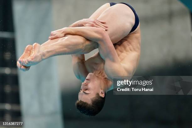 Anton Down-Jenkins of New Zealand competes in the Men's 3m Springboard Preliminary on day five of the FINA Diving World Cup at the Tokyo Aquatics...