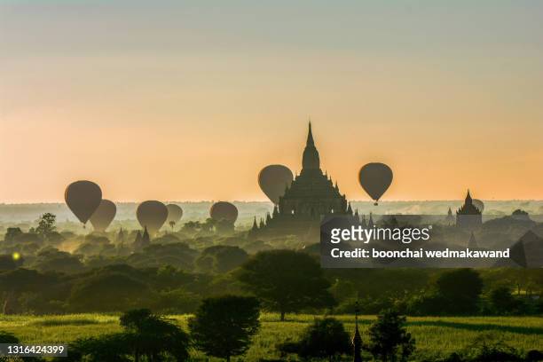 hot air balloons in bagan, myanmar - myanmar stock pictures, royalty-free photos & images