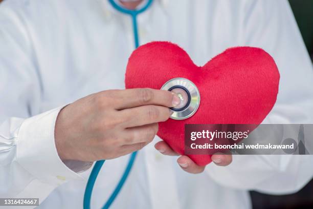 heart disease,heart disease centre - cholesterol doctor stock pictures, royalty-free photos & images