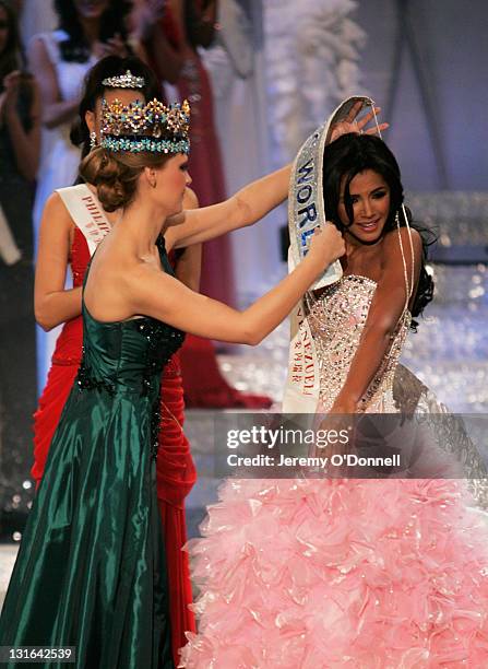 Miss Venezuela Ivian Sarcos receives her Miss World 2012 sash from Miss World 2011 by Miss World 2010, Alexandria Mills in the Miss world 2011 World...