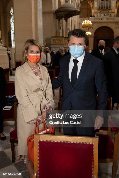 Laura Tenoudji and Christian Estrosi attend the mass given in memory of the Emperor Napoleon at Les Invalides on May 05, 2021 in Paris, France.