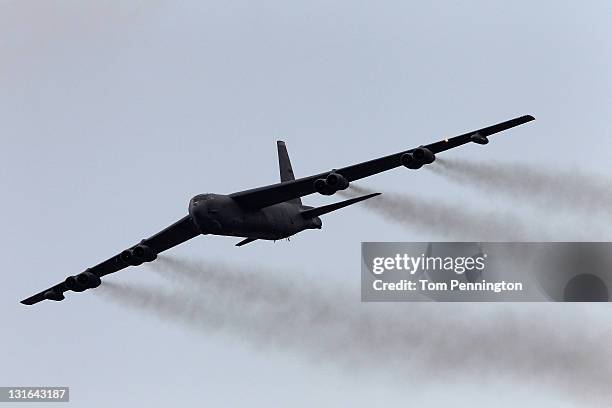 Bomber flys over the track during pre-race activities prior to the start of the NASCAR Sprint Cup Series AAA Texas 500 at Texas Motor Speedway on...