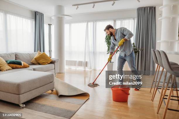 cleaning home - mop stock pictures, royalty-free photos & images