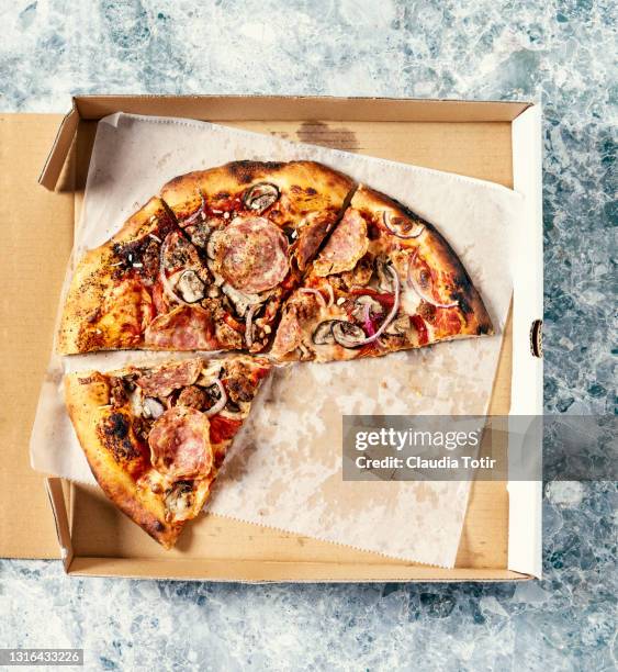 pizza in a box on gray, stone background - takeaway box stock pictures, royalty-free photos & images