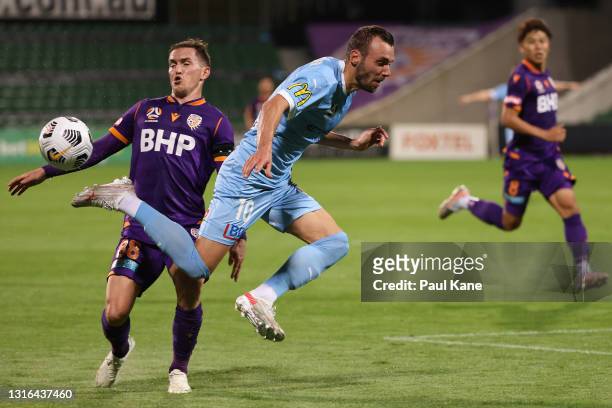 Florin Berenguer-Bohrer of Melbourne City is challenged by Neil Kilkenny of the Glory during the A-League match between the Perth Glory and Melbourne...