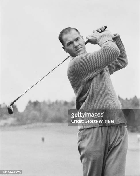 Kel Nagle of Australia watches his drive off the tee during the Daks £2,000 Golf Tournament on 16th May 1951 at the Sunningdale Golf Club in...