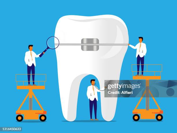 examining teeth with braces - orthodontic appliance stock illustrations