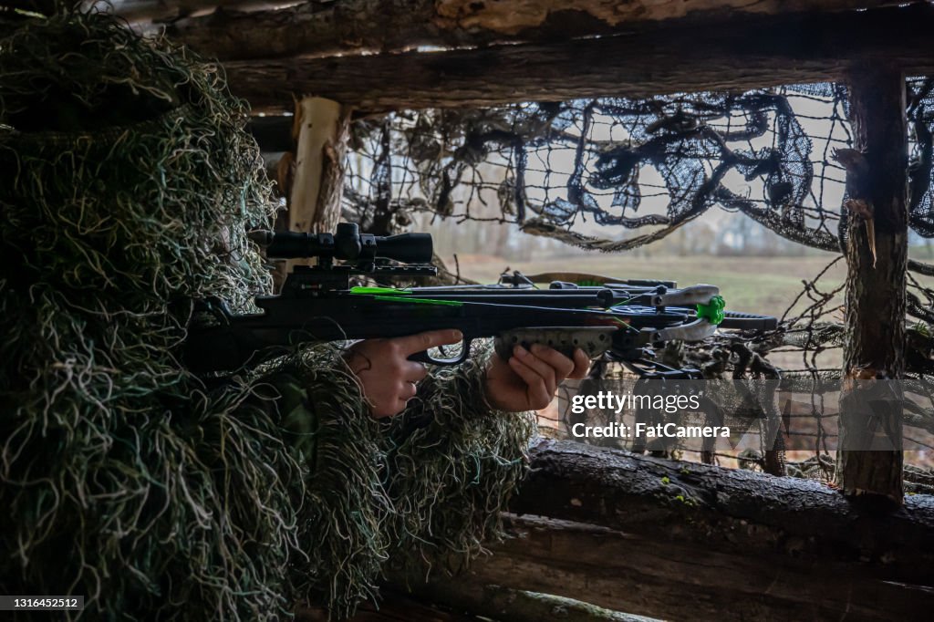 Crossbow hunting in a blind