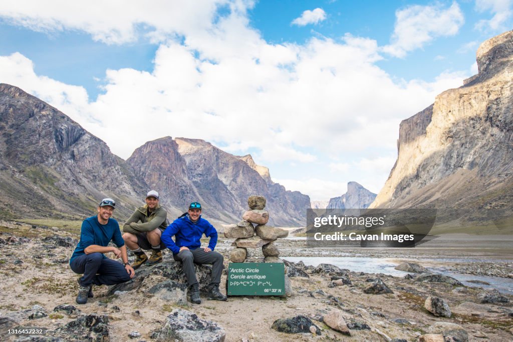 Three mountaineers pose for picture at the Arctic Circle Akshayuk Pass