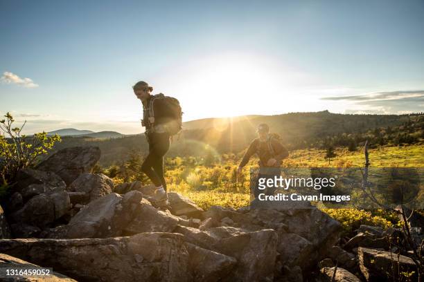 couple hiking at mount rogers in virginia. - appalachian trail fotografías e imágenes de stock