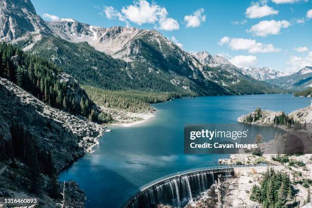 landscape of a mystic lake in montana with a blue sky - bozeman stock pictures, royalty-free photos & images