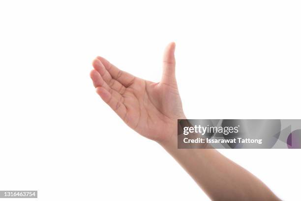 empty hand showing gesture holding the bottle, smartphone or something isolated on white background with clipping path. - pouce fond blanc photos et images de collection