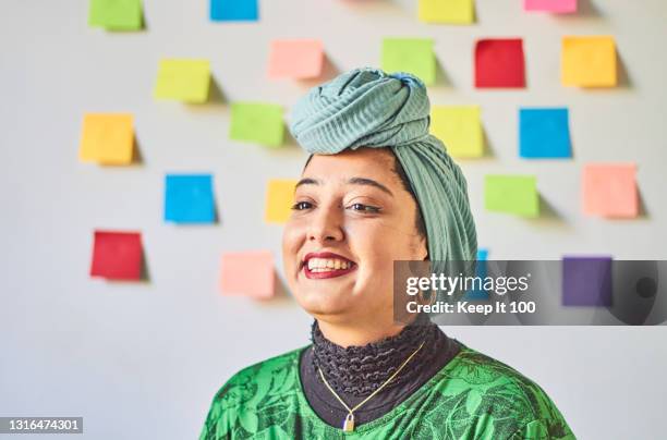 a portrait of a confident, successful woman - real people office stock pictures, royalty-free photos & images