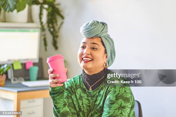 a portrait of a confident, successful woman - headscarf stock pictures, royalty-free photos & images