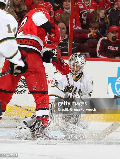 Kari Lehtonen of the Dallas Stars blocks a shot by Eric Staal of the Carolina Hurricanes during a NHL game on November 6, 2011 at RBC Center in...