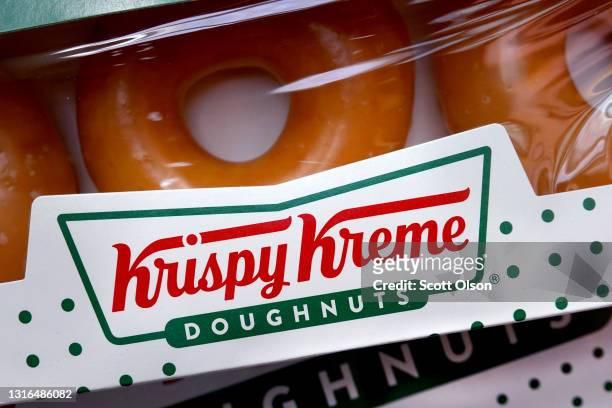 Original Glazed doughnuts are sold at a Krispy Kreme store on May 05, 2021 in Chicago, Illinois. The doughnut chain reported yesterday that it plans...