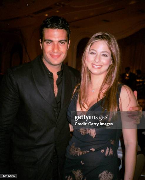 Singer Jaime Camil poses with "Lente Loco" host Odalys Garcia at the Don Francisco gala June 8, 2001 in Beverly Hills, CA. Don Francisco is the talk...