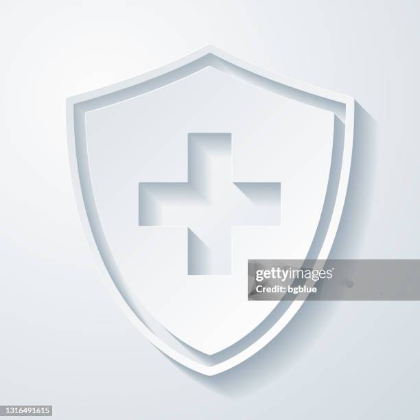 health protection shield. icon with paper cut effect on blank background - immune system protection stock illustrations