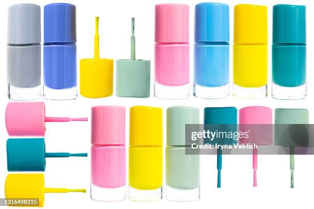 nail polish in trendy pastel rainbow colors on white background. - aqua nail polish stock pictures, royalty-free photos & images