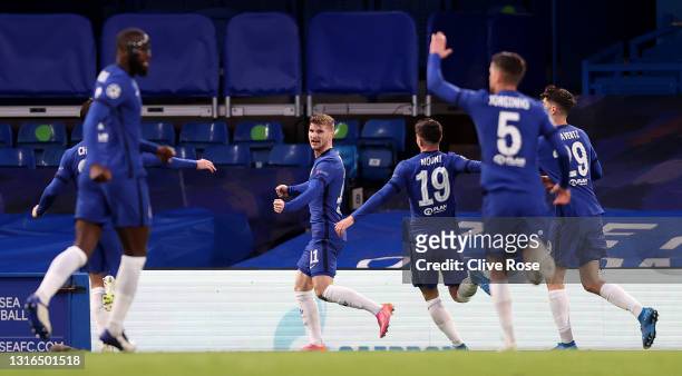 Timo Werner of Chelsea celebrates with teammates after scoring their team's first goal during the UEFA Champions League Semi Final Second Leg match...