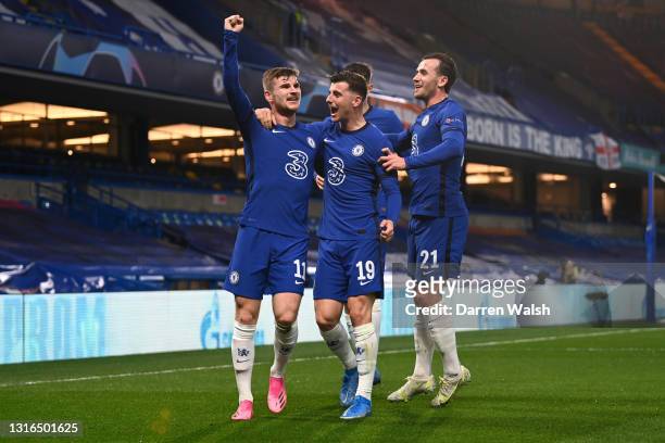 Timo Werner of Chelsea celebrates with teammates Mason Mount, Kai Havertz and Ben Chilwell after scoring their team's first goal during the UEFA...