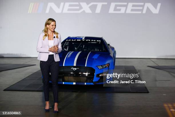 Host Shannon Spake unveils the seventh generation of the NASCAR Cup Series Chevrolet, Ford and Toyota cars during the NASCAR Next Gen Car...