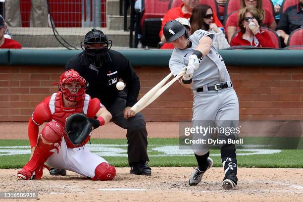 Andrew Vaughn of the Chicago White Sox breaks his bat flying out in the sixth inning against the Cincinnati Reds at Great American Ball Park on May...