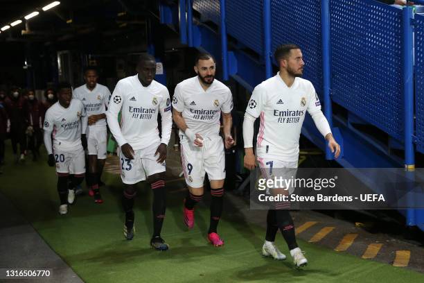 Eden Hazard of Real Madrid and teammates Karim Benzema, Ferland Mendy, Eder Militao and Vinicius Junior walk out onto the pitch for the second half...
