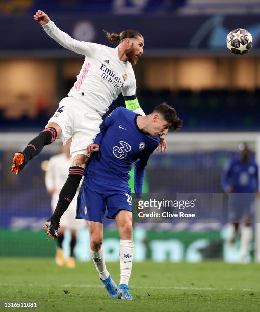 Kai Havertz of Chelsea battles for possession with Sergio Ramos of Real Madrid during the UEFA Champions League Semi Final Second Leg match between...