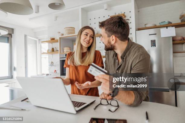 couple in the kitchen love happy - online shopping bildbanksfoton och bilder