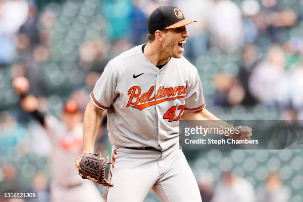 John Means of the Baltimore Orioles reacts after recording the final out of his no-hitter against the Seattle Mariners to win 6-0 at T-Mobile Park on...