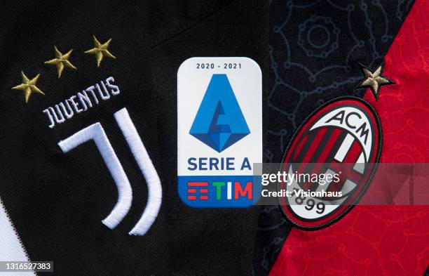 The Juventus and AC Milan club badges on their first team home shirts with the Serie A logo on May 5, 2021 in Manchester, United Kingdom.