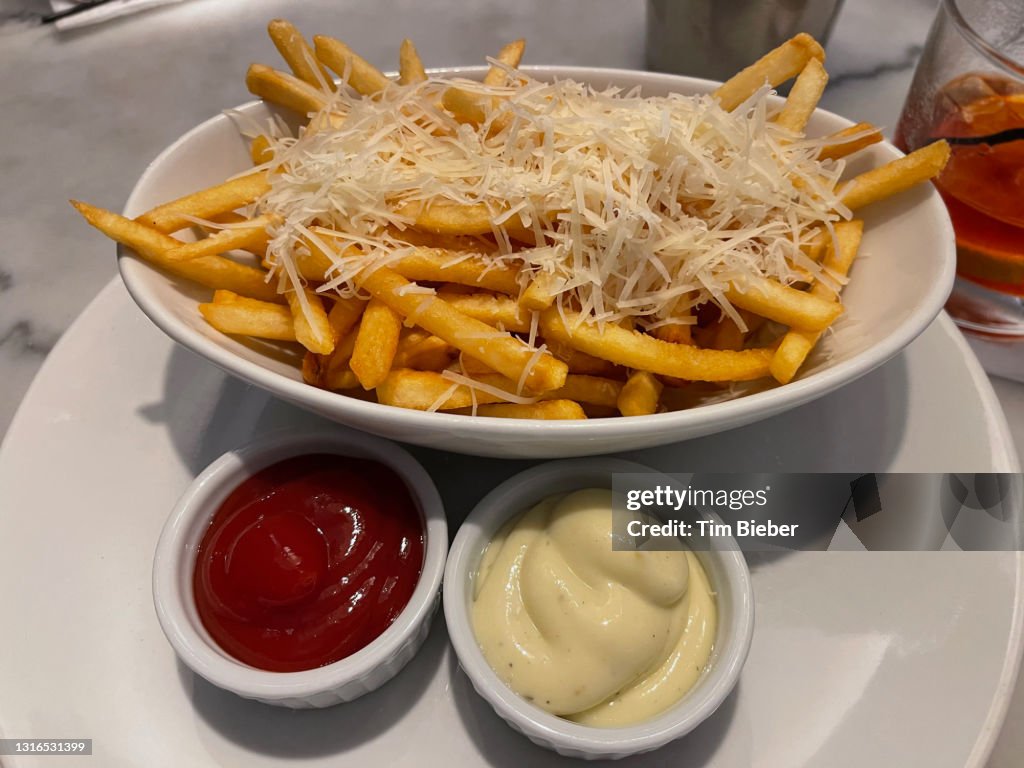 French Fries / chips with parmesan cheese, truffled mayonnaise and ketchup