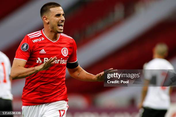 Thiago Galhardo of Internacional celebrates after scoring the third goal of his team during a match between Internacional and Olimpia as part of...