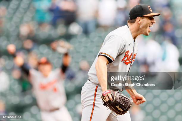 John Means of the Baltimore Orioles reacts after recording the final out of his no-hitter against the Seattle Mariners to win 6-0 at T-Mobile Park on...