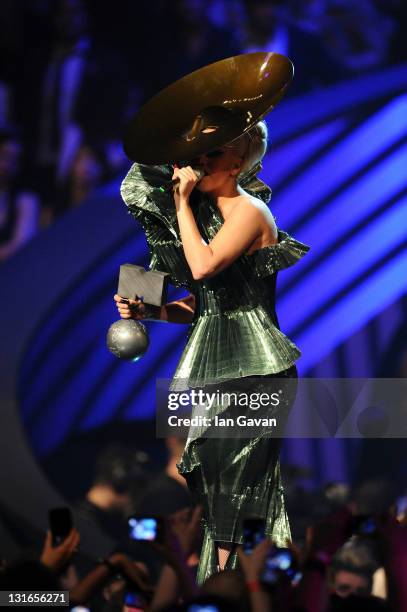 Singer Lady Gaga receives the Best Song award for 'Born This Way' onstage during the MTV Europe Music Awards 2011 live show at at the Odyssey Arena...