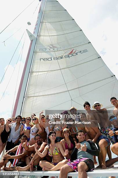 Staff pose on November 6, 2011 in Aruba, Aruba. Red Sail Sports boasts four custom built luxurious catamarans which offer exhilarating rides through...