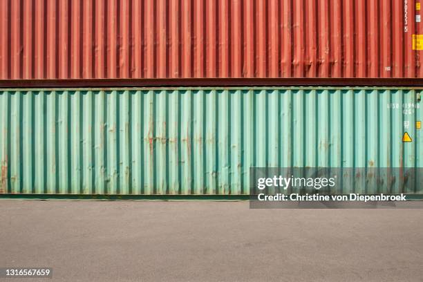colorful transportation boxes at harbour - container stock pictures, royalty-free photos & images