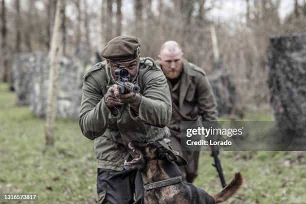 two soldiers during a military outdoor operation - army navy game stock pictures, royalty-free photos & images