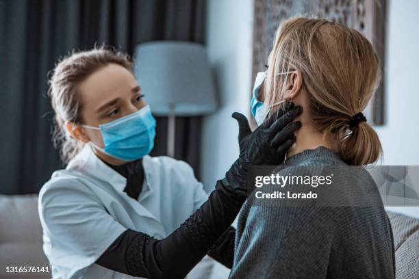 home administered medical exam - administered stock pictures, royalty-free photos & images