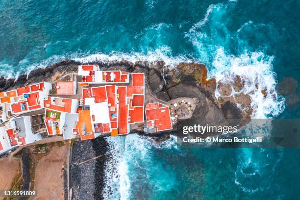 aerial view of colorful coastal village, grand canary, spain - las palmas de gran canaria foto e immagini stock