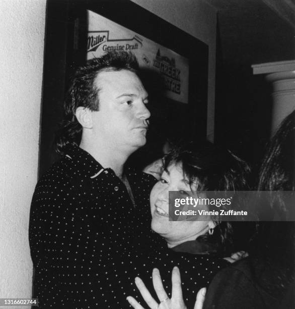 Comedian Roseanne Barr and her boyfriend, Tom Arnold, at a Ringo Starr performance in Los Angeles, US, circa 1990.�