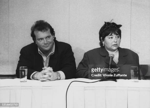 Comedian Roseanne Barr and her husband Tom Arnold at a press conference following her controversial performance of the national anthem at the San...